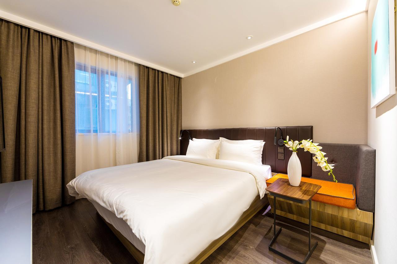 ฮั่นถิง พรีเมียม โฮเทล ต้าผูเฉียว ซันมูน ไลท์ เซ็นเตอร์ Hotel เซี่ยงไฮ้ ภายนอก รูปภาพ